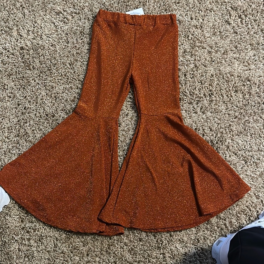 These are a rust color but has a sparkle to them